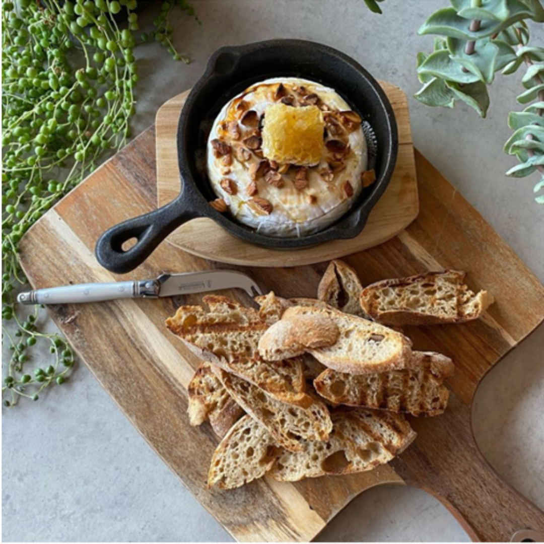 Image of the Baked Brie with honey and nuts and crackers